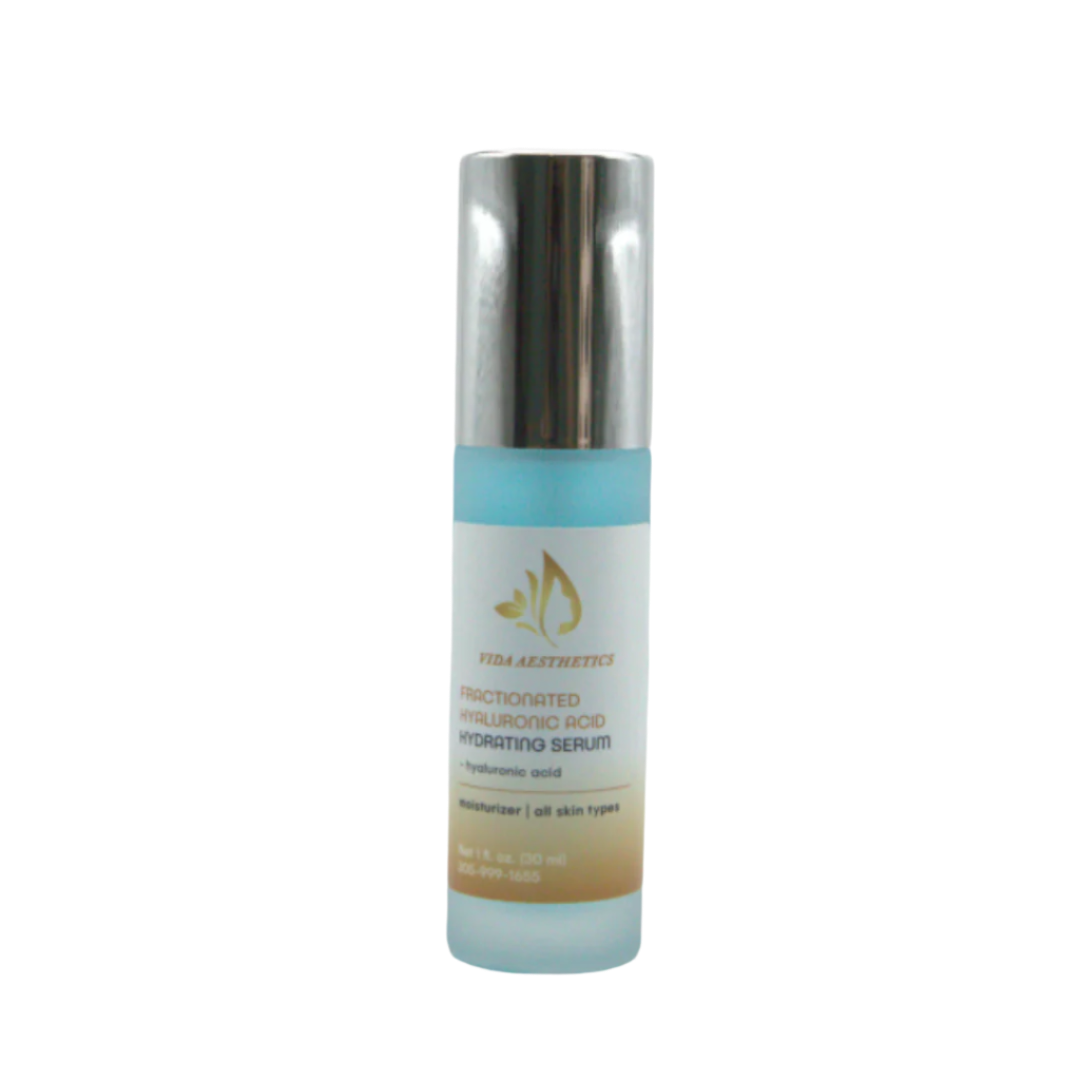 Skincare serum bottle with gradient design on a white background