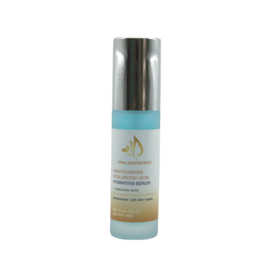 Skincare serum bottle with gradient design on a white background