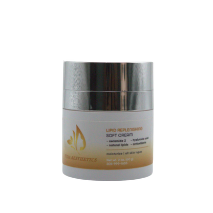 Skincare cream jar with metallic cap on a white background