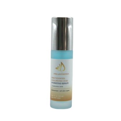 Skincare serum bottle with gradient design on a white background
